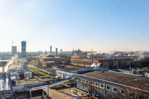 Industrial landscape under sunny light. Old industrial town.