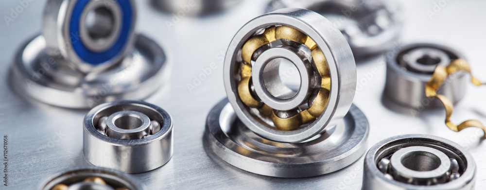 different bearings on a metal background. Part of mechanism. different bearings on a metal background. Part of mechanism.