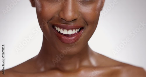 Black woman, teeth and dental hygiene for skincare cosmetics on a gray studio background. Closeup of African female person, mouth or smile for dentist, tooth whitening or oral and gum care treatment photo
