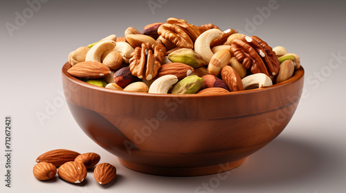 mixed nuts in bowl. Mix of various nuts on colored background. pistachios, cashews, walnuts, hazelnuts, peanuts , generate AI