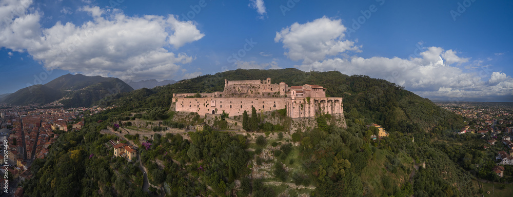 Aerial panorama of Castello Malaspina di Massa in Italy. Historic castle of Italy aerial view.