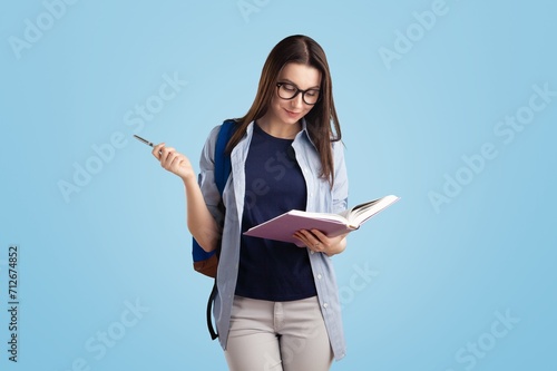Modern beautiful woman student posing