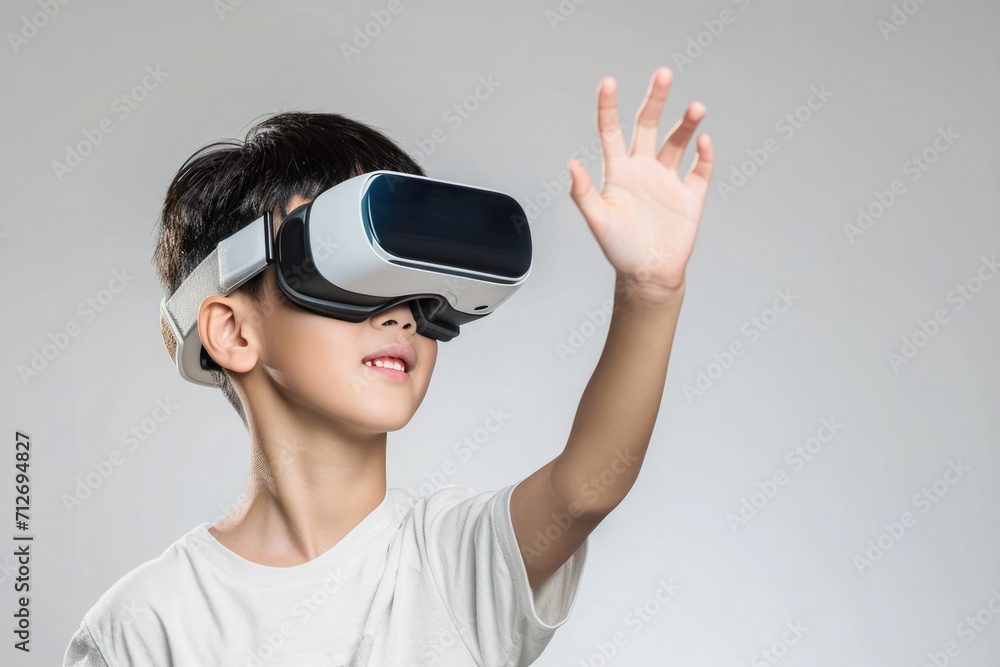 A young boy wearing a virtual reality headset A young boy wearing a virtual reality headset