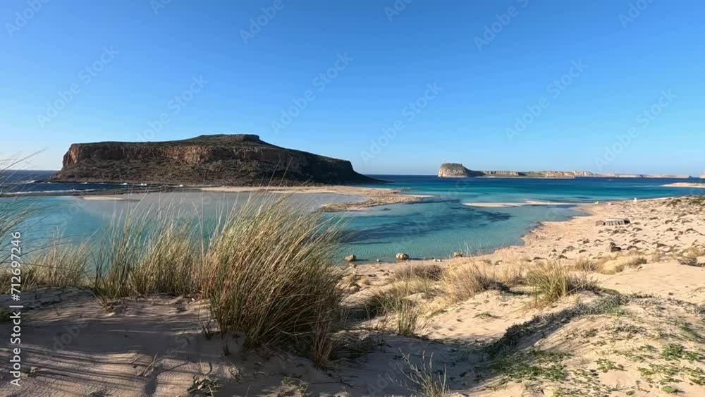 Amazing view of Balos Lagoon with magical turquoise waters, lagoons, tropical beaches of pure white sand and Gramvousa island on Crete, Greece Amazing view of Balos Lagoon with magical turquoise waters, lagoons, tropical beaches of pure white sand and Gramvousa island on Crete, Greece