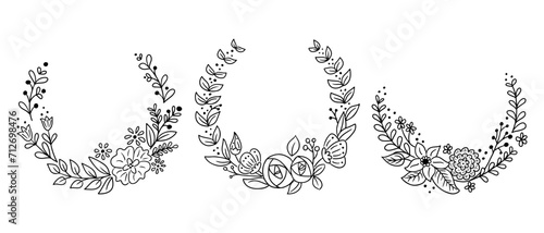 Romantic set of floral doodle wreaths or frames