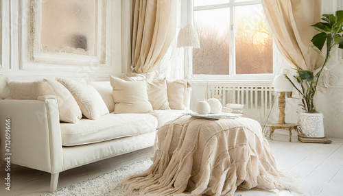 White cushions and cream color blanket on white sofa against of window. Scandinavian style interior design of modern living room, soft pastel colors