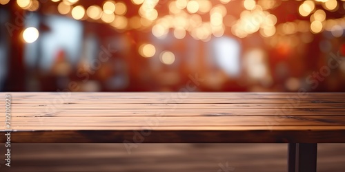 Empty wooden table  blurred interior and light background  suitable for product montage  for use in cafes and restaurants.