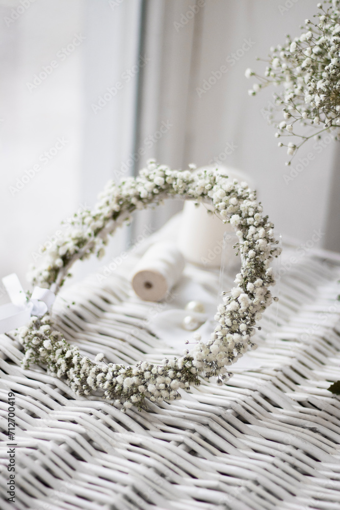 Obraz premium Bridal flower crown. White gypsophila wedding accessories. Bridal flowers in white colors