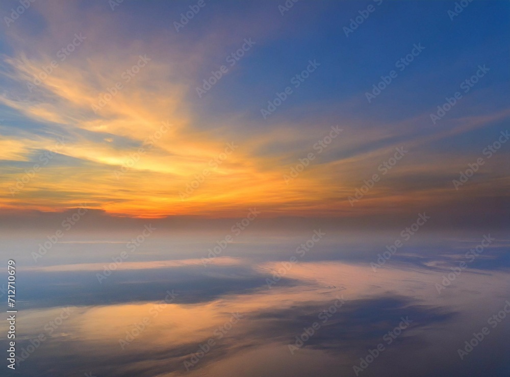 Sunrise on the sky, view from an airplane. Travel background/wallpaper with orange clouds and copy space. Sunrise on the sky, view from an airplane. Travel background/wallpaper with orange clouds and copy space.