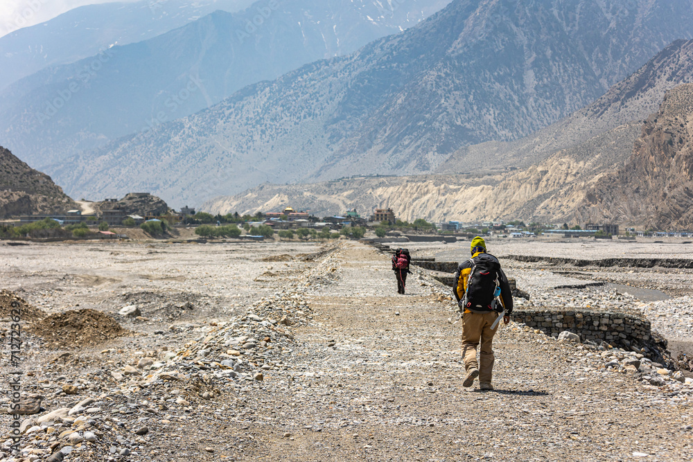 Fototapeta premium hiking in the mountains, trek tour of the anapurnas