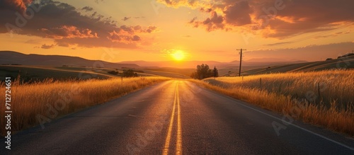 Sunrise over an empty road