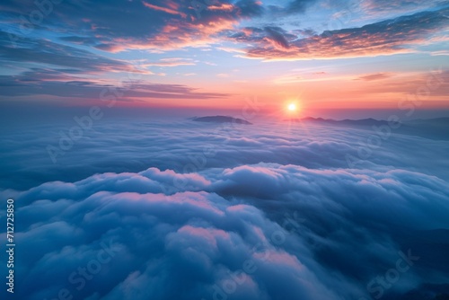 Panorama sunrise from the top of the mount Fuji. The sun is shining strong from the horizon over all the clouds and under the blue sky. good New year new life new beginning. Abstract nature background photo