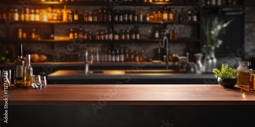 Product display montage with empty table top. Blurred dark kitchen in background. Bar and lifestyle concept.