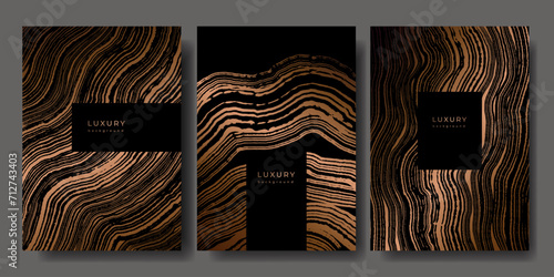 Set of templates. Luxury golden background with wood annual rings texture. Banner with tree ring pattern. Stamp of tree trunk in section. Wooden concentric circles. Black and bronze marble background