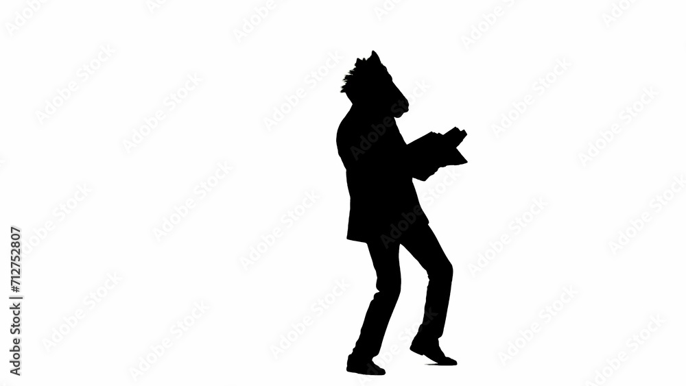 Black silhouette of man in business suit with horse head mask on white isolated studio background. A businessman is looking through documants and dancing merrily. Concept of hard office work.
