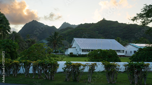 A school building in Rarotonga with the Emerald Mountains in the background photo