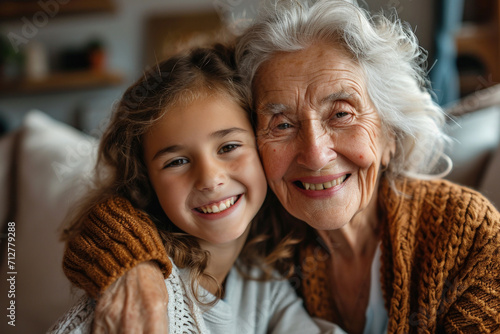 Grandmother with his granddaughter, laughing together and have a cheerful time