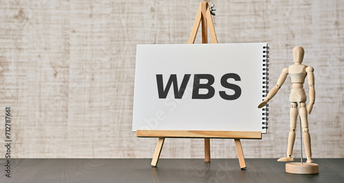 There is word card with the word WBS. It is an abbreviation for Work Breakdown Structure as eye-catching image.