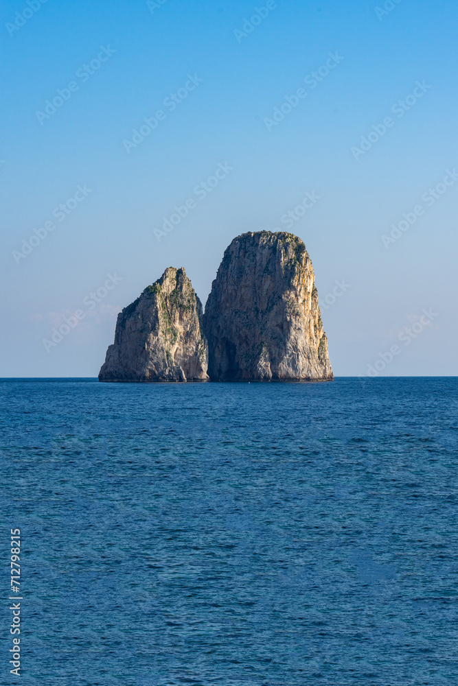 beautiful cliffs by the beach of the small marina .Island of Capri, Naples, Italy