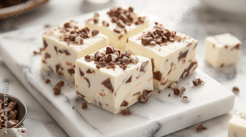 white marshmallow fudge on marble tray photo