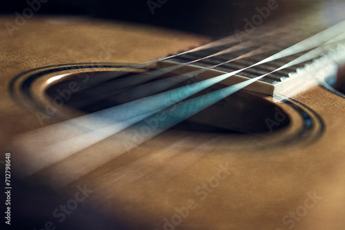 Flat top acoustic guitar with strings wood top and fretboard