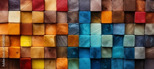 Vivid and eye catching arrangement of colorful wooden blocks on a wide format background