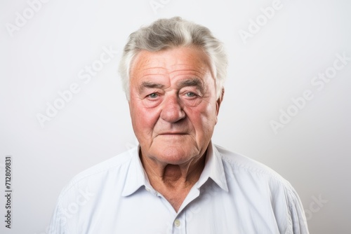 Portrait of a senior man. Isolated on white background.