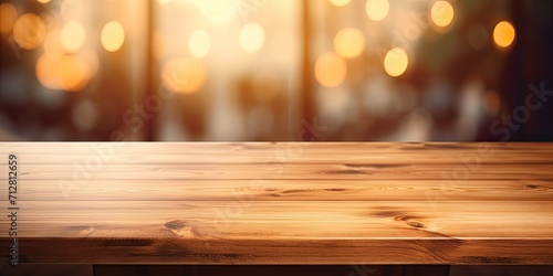 Blurred window light illuminating wooden table.