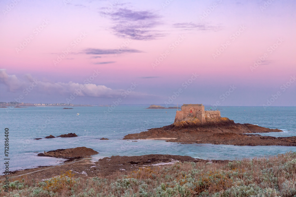 Fort National and beach in beautiful walled port city of Saint-Malo at sunrise, Brittany, France