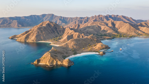 Aerial view of beautiful sunset at Pink beach, Flores Island, Indonesia.