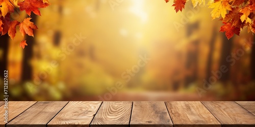Vibrant autumn backdrop with an empty wooden table.