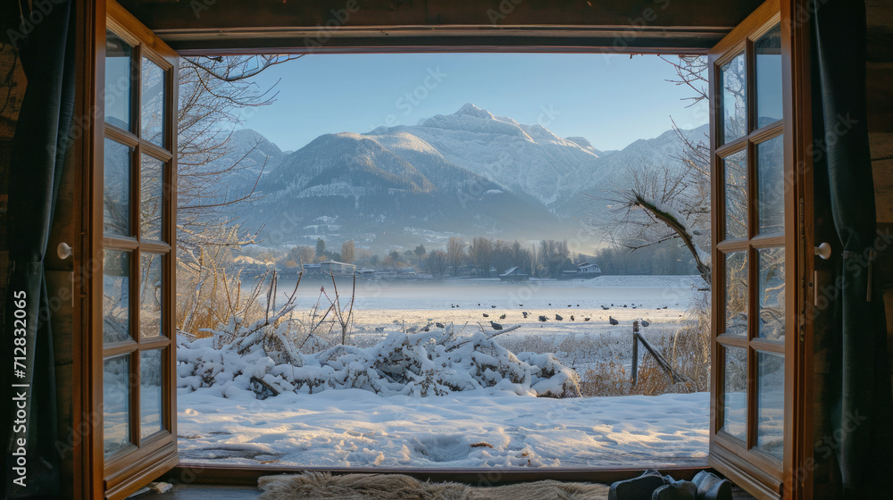 Fototapeta premium An open window in winter overlooking the winter landscape.