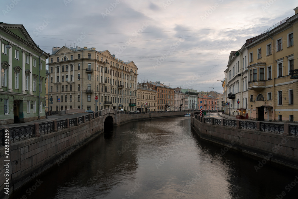 Moika River Embankment and the 2nd Winter Bridge on a cloudy spring morning, Saint Petersburg, Russia