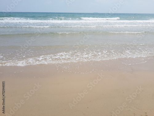 beautiful beach with waves and sea
