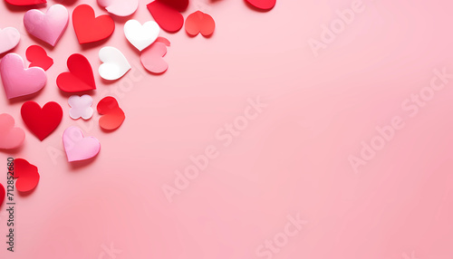 Red heart shape on pink background with copy space, Valentine’s day greeting card © mangpor.ai2003