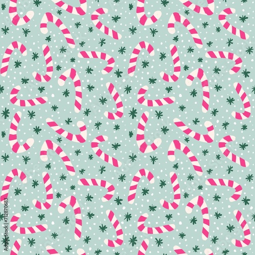 hand drawn seamless Christmas pattern with pink candy canes green snowflakes. Winter holiday festive celebration, cute funny7 snow on mint background, seasonal decoration print.