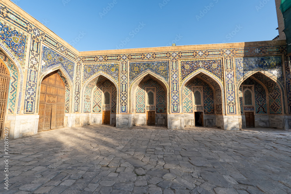 the Sher-Dor Madrasah at the Registan Square in Samarkand, Uzbekistan. The Registan is a popular tourist attraction of Central Asia.