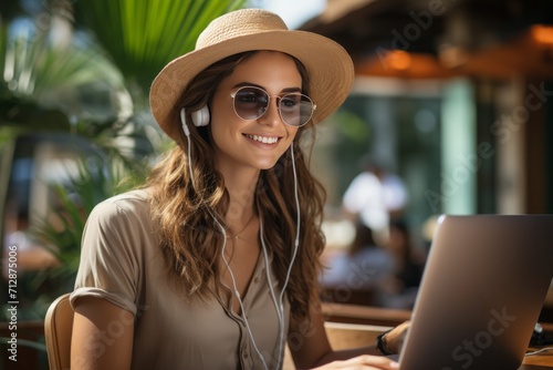 Businesswoman enjoying the coastal breeze while managing business tasks at an open-air cafe during summer, Generative AI