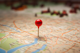 Red pushpin on a map of the city