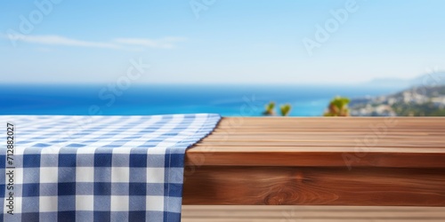 Tablecloth-covered wooden deck table with ample space for your text.