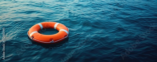 Lifebuoy floating at sea, space for copy