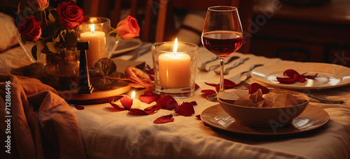 a romantic dinner at home with candles soft music