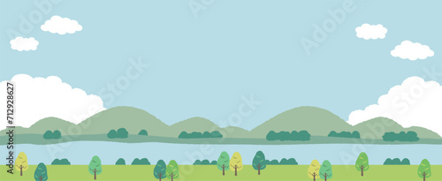 青空と山と川の草原の風景のイラスト