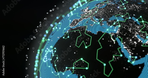 Image of glowing blue mesh of connections with icons over globe on black background photo