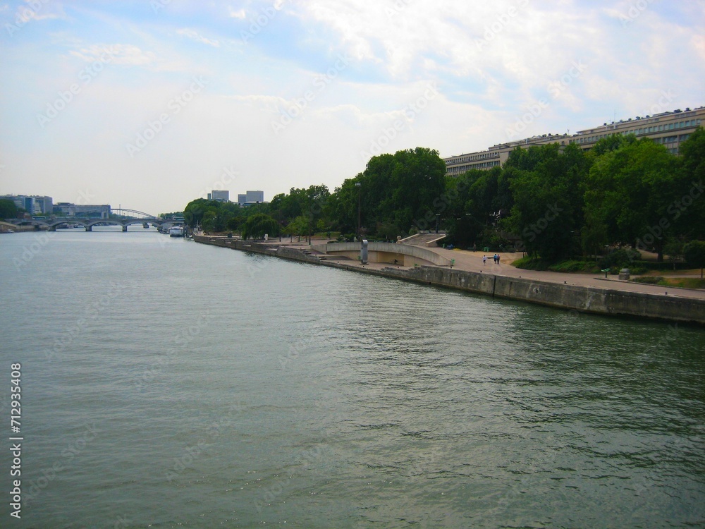 Seine river and Tino Rossi Garden in summer in Paris, France