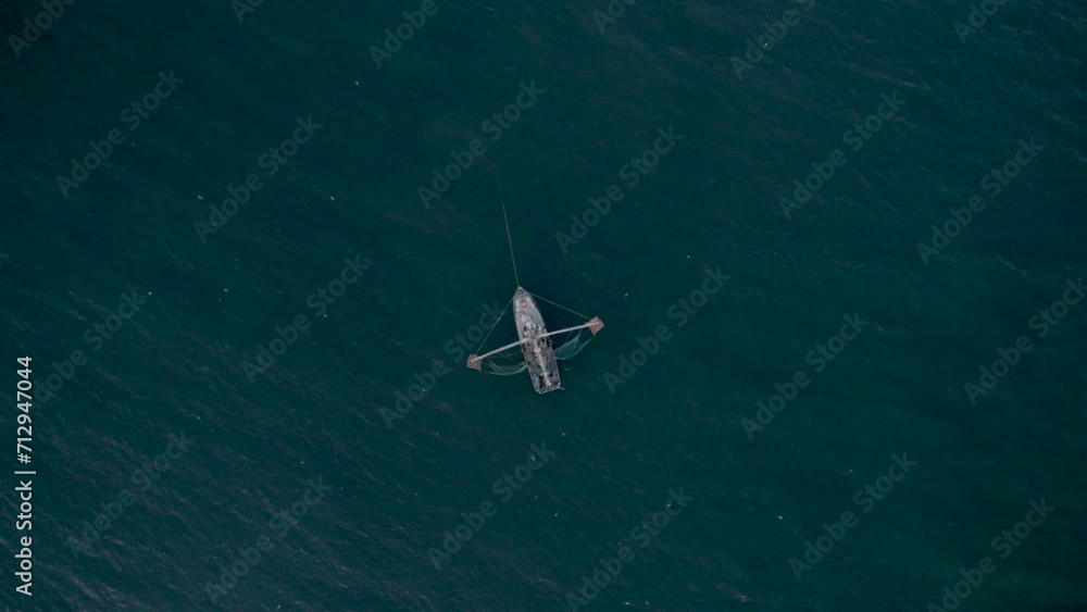 Aerial shot overhead of shrimp boat fishing at sea. Aerial shot overhead of shrimp boat fishing at sea.