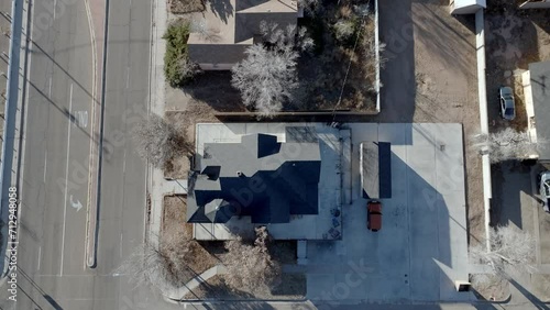 Neighborhood in Tucumcari, New Mexico with drone video looking down on houses. photo