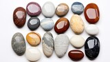 Different natural There are 12 small rocks which surface color is beautiful pettern, white background