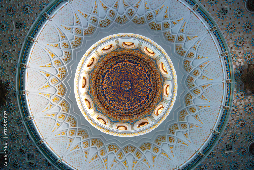 Interior of Hazrati Imam mosque with blue traditional carpet. inside mosque