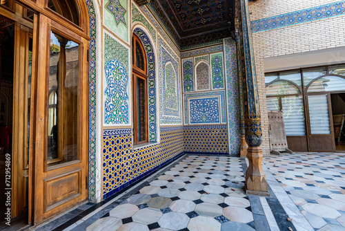 Beautiful traditional Uzbek architecture. The entrance to the house decorated with mosaics. photo